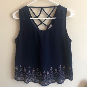 Blouse with pink detailing and crossed back